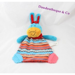 Doudou flat donkey Corsica between sky and sea blue red bell