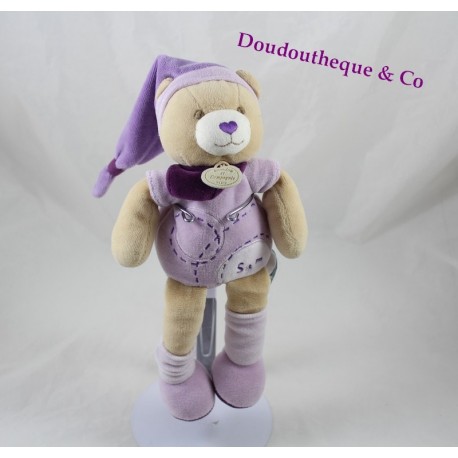 Doudou Sam Bär KUSCHELTIER UND GESELLSCHAFT Lila Mütze 25 cm