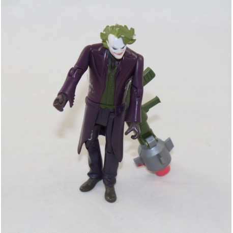 Figurine articulée Le Joker DC COMICS Batman avec arme coup de poing