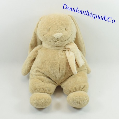 Peluche lapin THE PLUSHIES beige écharpe écru grand sourire 36 cm