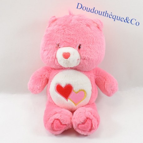 Pink care bear with two sales hearts