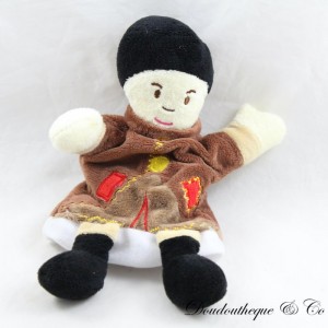 Asian puppet cuddly toy with its mat
