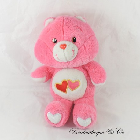 Osito de peluche Care Bears CARE BEARS besos rosa patrón de corazón 40 cm Osito de peluche Care Bears CARE BEARS besos rosa patrón de corazón 40 cm