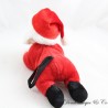 Peluche Père Noël couché sur le ventre