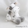Stuffed white cow with grey spots