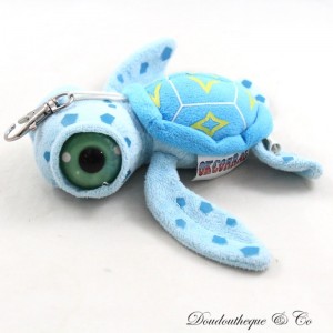 Llavero de peluche tortuga OK CORRAL ojos grandes azules Parque de atracciones 13 cm