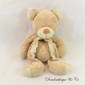NICOTOY Bastien beige bear plush with brown embroidered crosses 28 cm