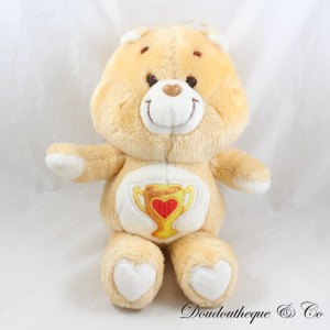 Peluche ours Bisounours CARE BEARS Vintage coupe d'or
