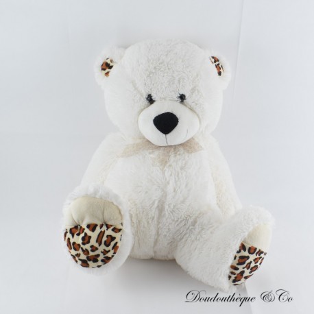 Grande peluche ours CORA Blanc noeud satin assis pattes leopard 50
