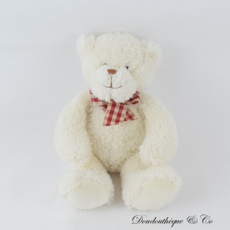 Stoffbär CREAPRIM weißer Sitzschal beige mit rotem Karo 24 cm Stoffbär CREAPRIM weißer Sitzschal beige mit rotem Karo 24 cm