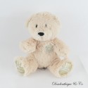 NOCIBÉ Bär Plüsch beige Schneeflocke 2021 sitzend 19 cm