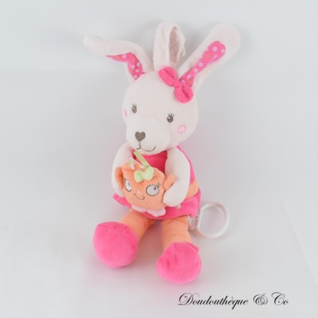 Musikalisches Stoffkaninchen TEX BABY Eulenkleid und Schleife Rosa 29 cm Musikalisches Stoffkaninchen TEX BABY Eulenkleid und Schleife Rosa 29 cm