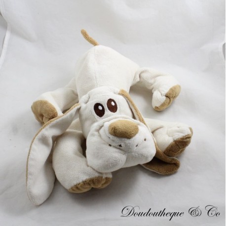 Braunbeiger Hundeplüsch auf dem Bauch liegend Braunbeiger Hundeplüsch auf dem Bauch liegend